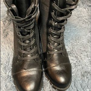 XOXO tipper side, lace up, black heeled boot.